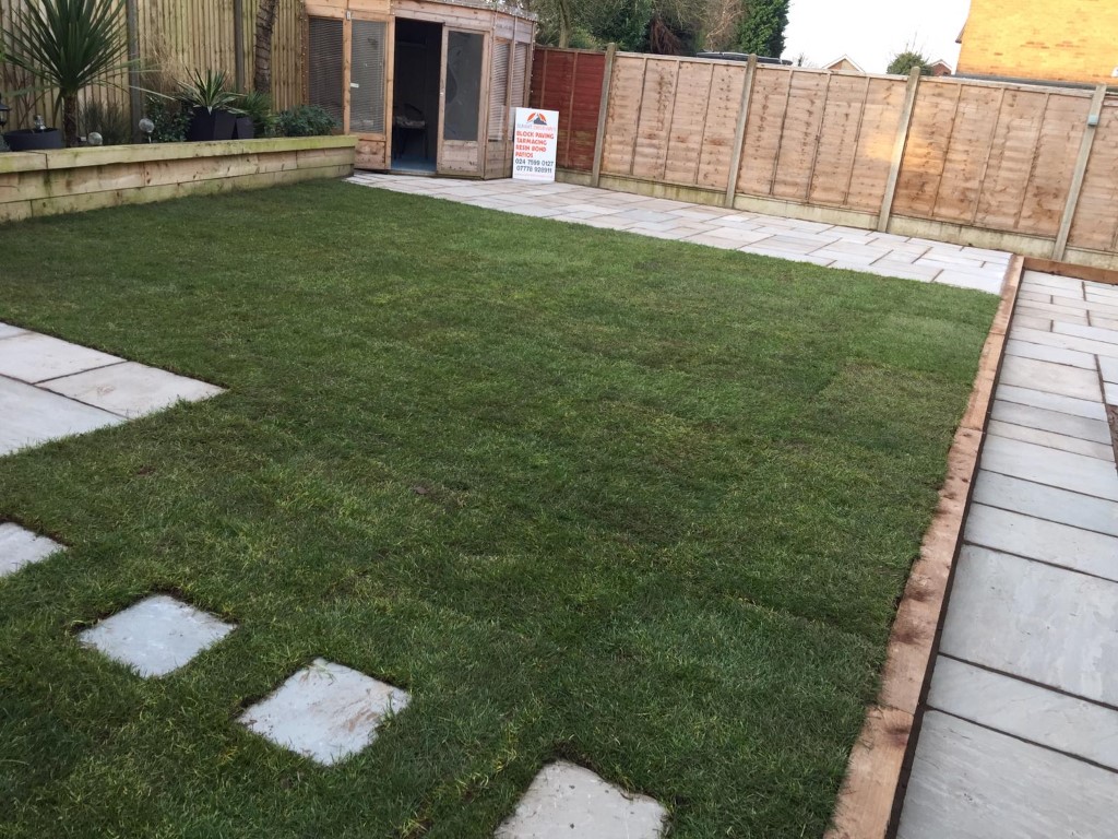Indian Sandstone Patio with Timber Sleepers and Turf in Nuneaton