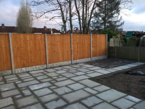 Indian Sandstone Patio with new Fencing in Rugby