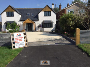 Resin Bound Driveway with Tarmac Aprons and Tegula Paved Pathways in Nuneaton